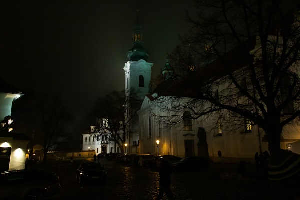 A monastery on a dark foggy night